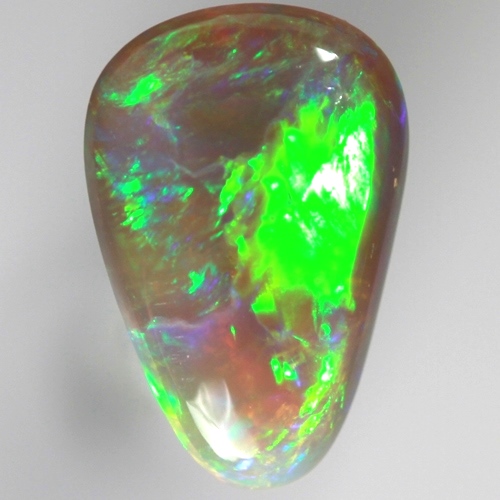 SOLID SEMI BLACK OPAL Very bright neon green rolling flashes